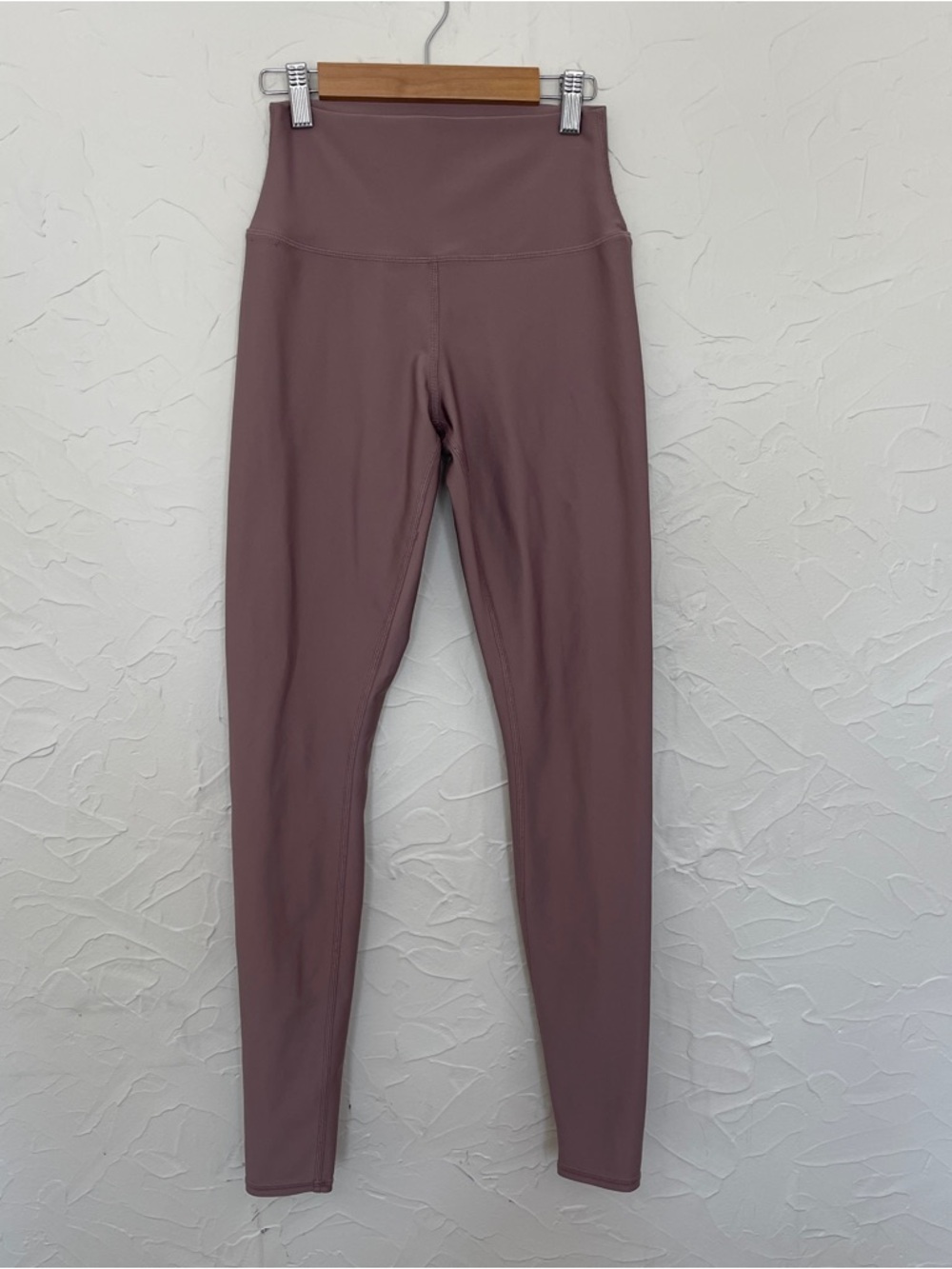 ALO Yoga Airlift Leggings in a mauve color. High waist